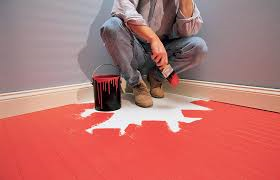 small blotchy red paint on the floor
